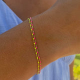 PULSERA ESMALTE ROSA FLÚOR