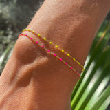 PULSERA ESMALTE ROSA FLÚOR