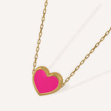GARGANTILLA CORAZÓN ESMALTE ROSA FLÚOR
