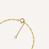 PULSERA ESMALTE AMARILLO FLÚOR